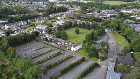 blarney village and large castle car park ireland drone aerial footage