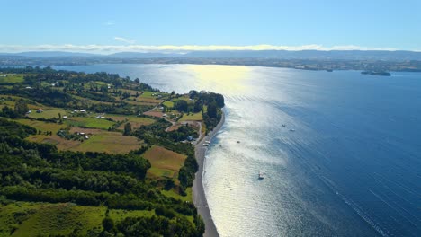 Aerial-view-of-Pisciculture-and-beaches-on-the-coast-of-Lemuy-island,-Chile