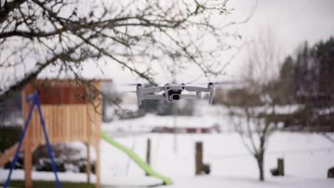 drone with camera stationary in mid-air