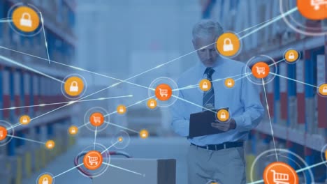 Animation-of-network-of-connections-with-icons-over-man-writing-on-clipboard-in-warehouse