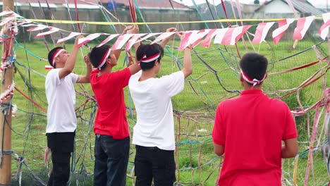 friends with red and white headbands full of joy and preparing for festive august 17th celebration