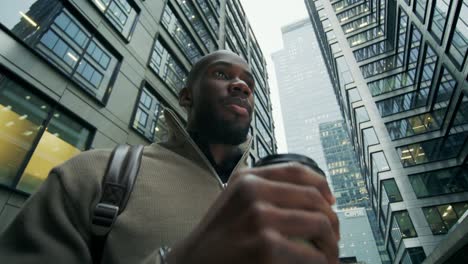 businessman drinking coffee in the city