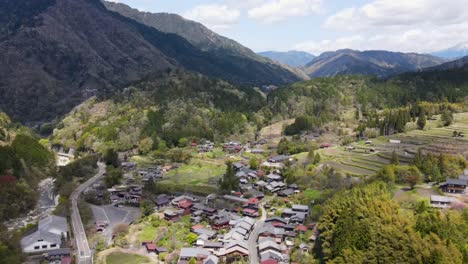 scenic aerial view of kiso-hirasawa town in kiso valley located in the nagano prefecture, japan. dolly back, establishing shot