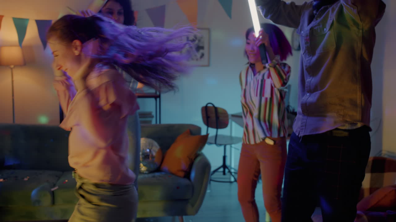 Friends Dancing at a Home Party