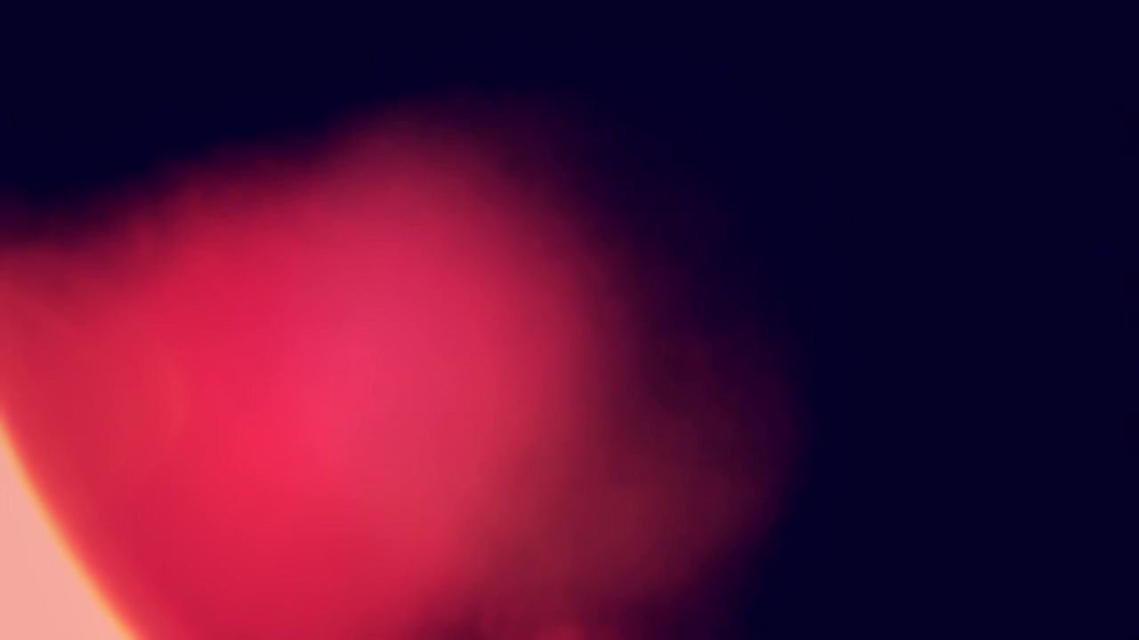 Abstract Red and Orange Light Leaks on Dark Background