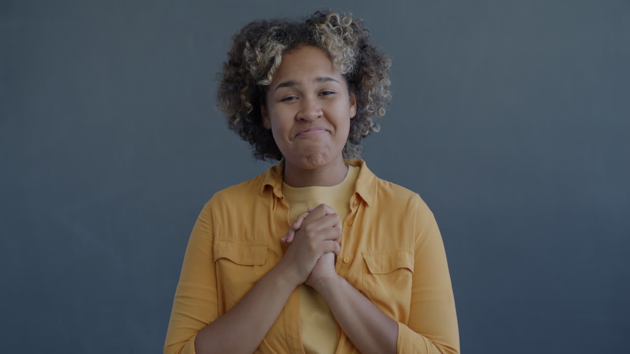 Woman with a hopeful expression