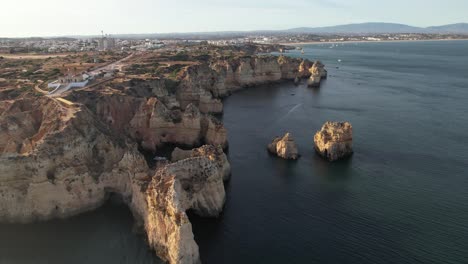 Aerial-view-of-Ponta-da-Piedade-rock-formations-in-Lagos,-Portugal