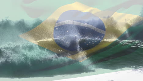 digital composition of waving brazil flag against waves in the sea