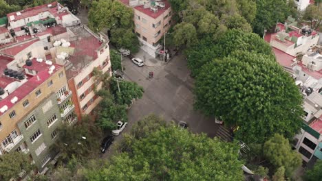 Suburbs-street-and-multi-story-apartments-in-Mexico-city,-aerial-view