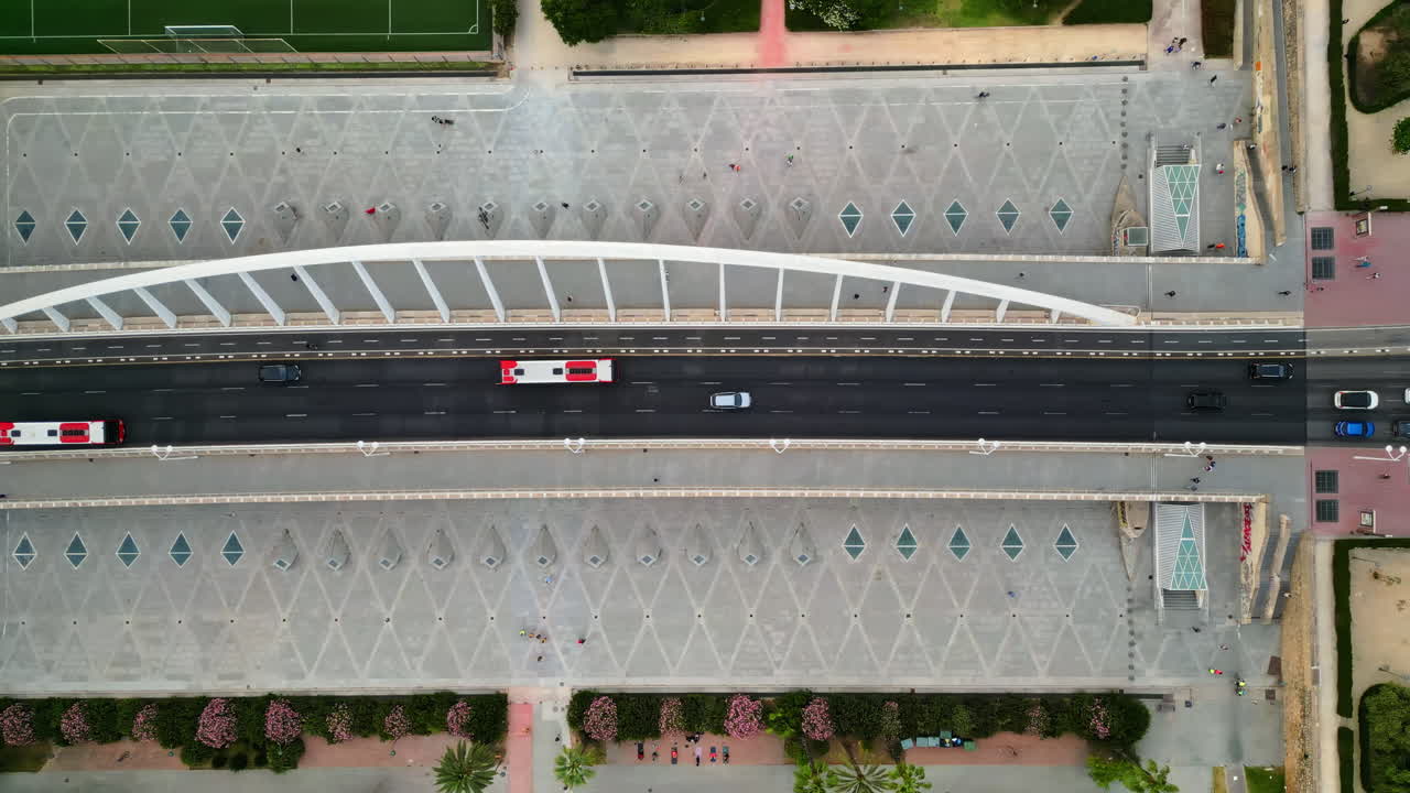 Cars and public transportation moving on the Exhibition Bridge in Valencia, Spain