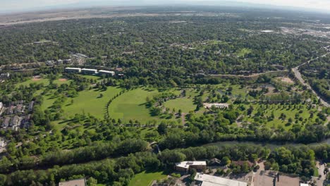 drone shot of the lush ann morrison park along the boise river in idaho