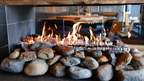 a fireplace with rocks and fire in it