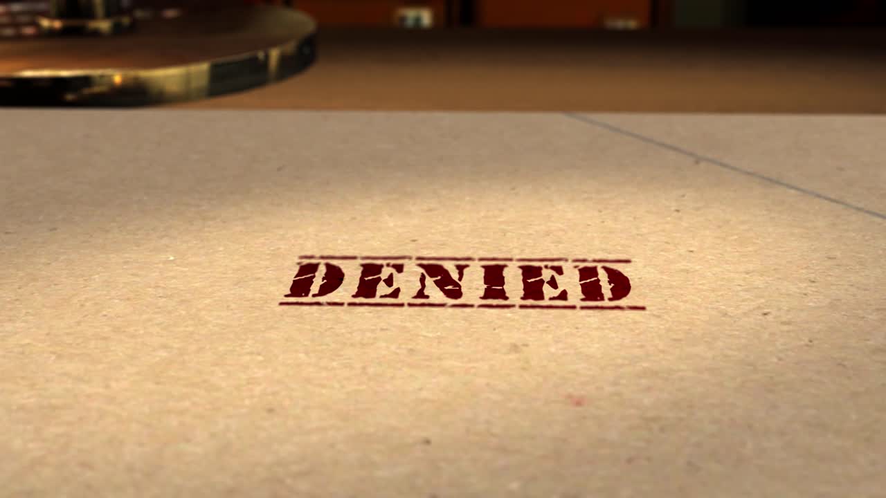 Motion graphics - CGI 3D animation of a file being rubber stamped DENIED