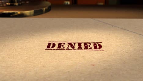 motion graphics - cgi 3d animation of a file being rubber stamped denied