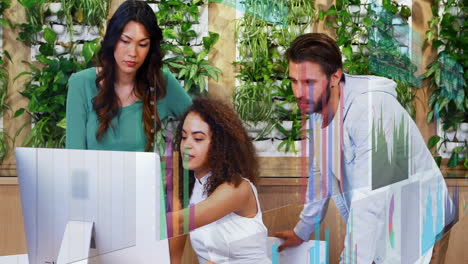 analyzing data charts on computer, diverse team in office with animation