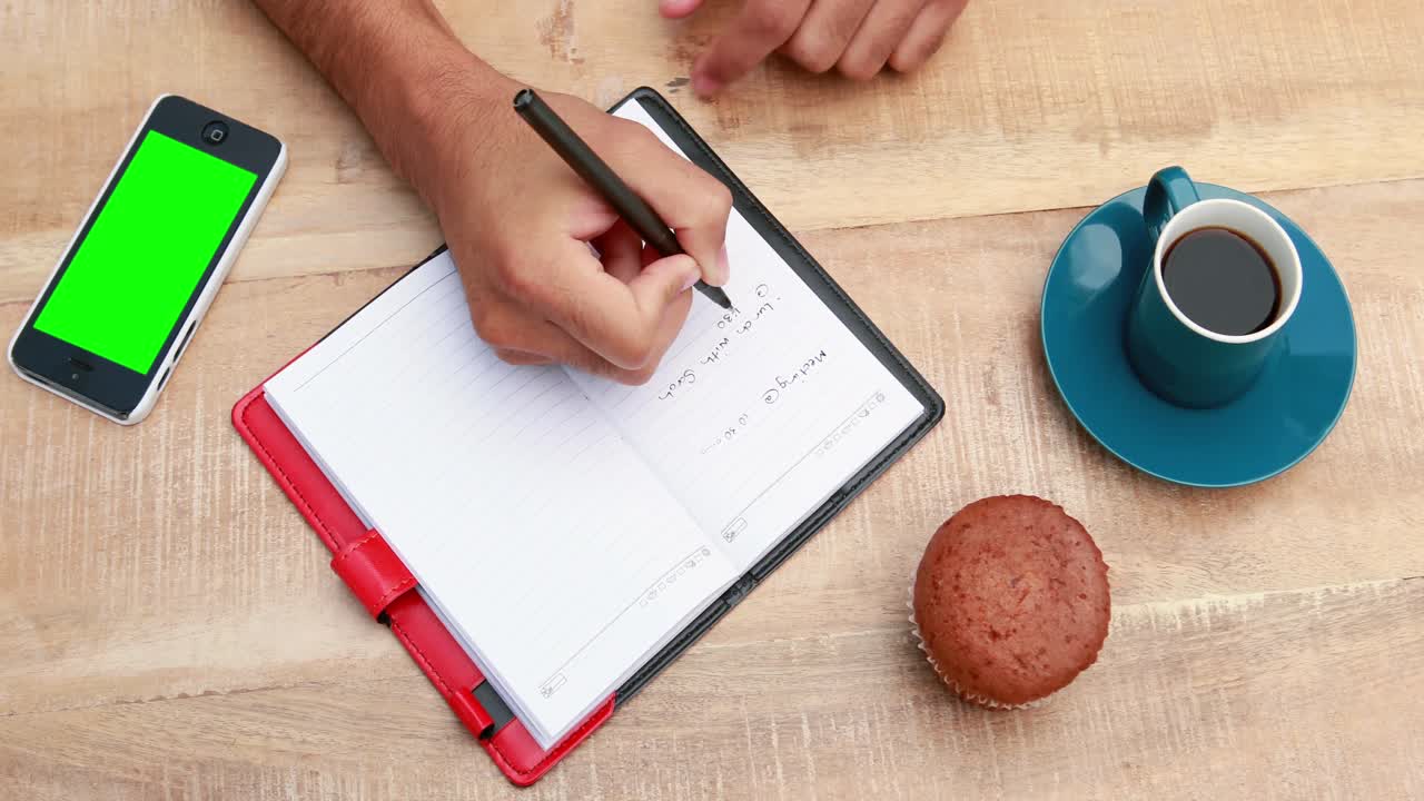 Overhead of man working at desk