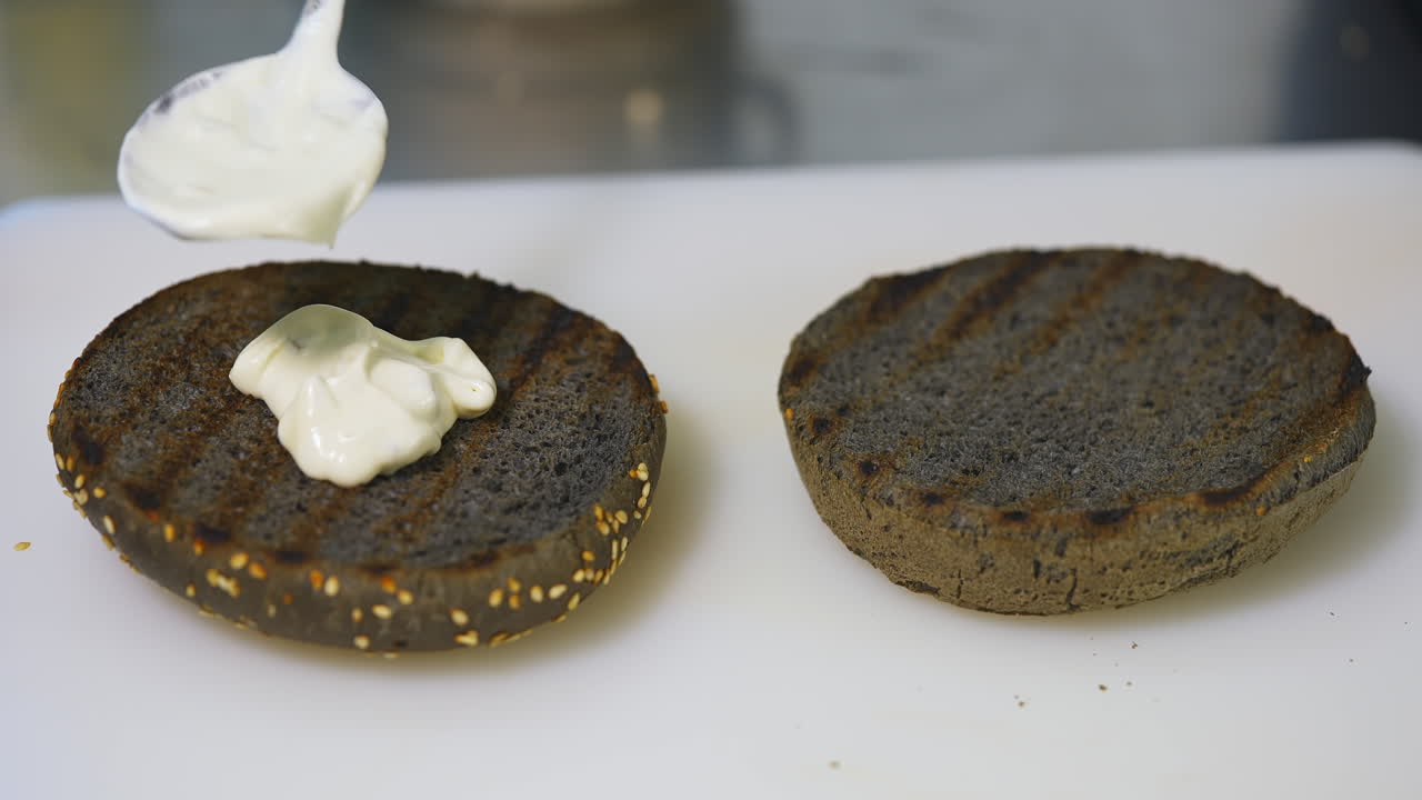 Hamburger made from natural ingredients. Close up of cooking hamburger in cafe kitchen