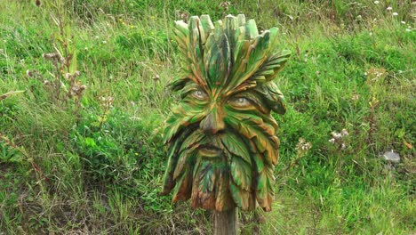 scary carving of the green man legend in many cultures all over the world at waterford ireland