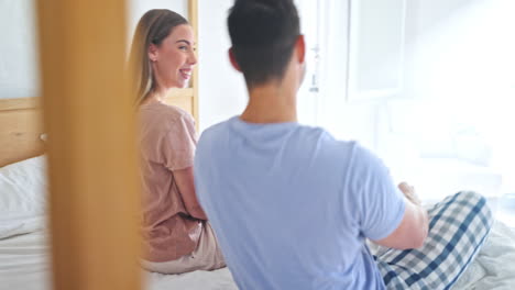 Funny,-love-and-happy-with-couple-in-bedroom