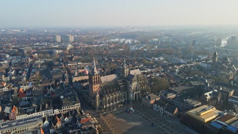 Beautiful aerial of the Sint-Janskathedraal Cathedral Church under renovation in 's-Hertogenbosch in the Netherlands on a sunny morning