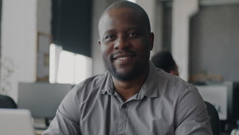 smiling businessman in office