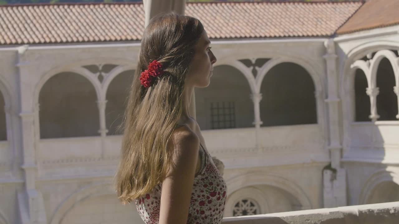 Woman looking at a Monastery
