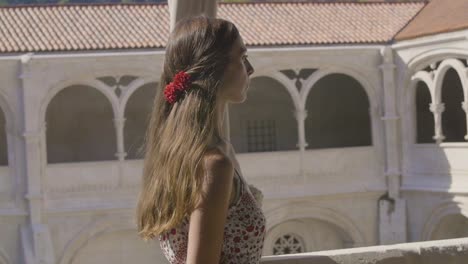 woman looking at a monastery