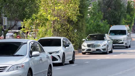 vehicles moving along a busy city road