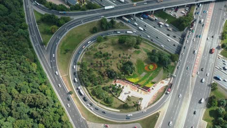 top down aerial view of highway intersection with traffic