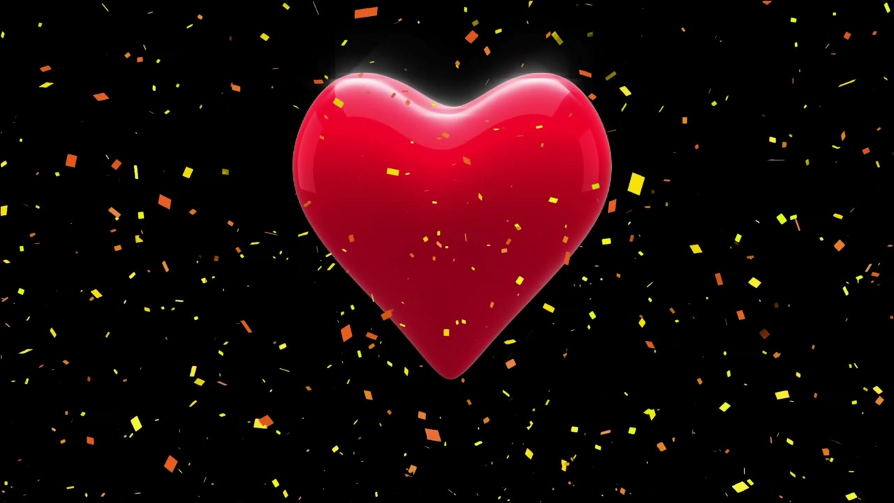 Animazione di coriandoli che cadono e un cuore rosso che pulsa su sfondo nero
