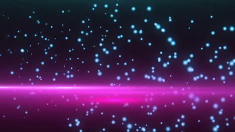 video of glowing pink light and blue snow falling on black background