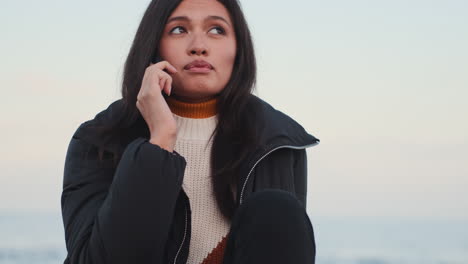 asian girl talking on mobile phone.