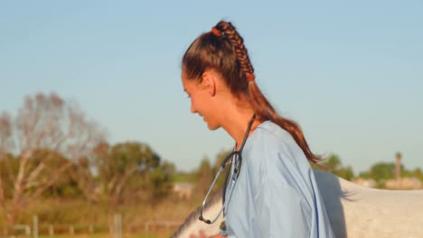 Veterinarian-doctor-standing-with-horse-4k