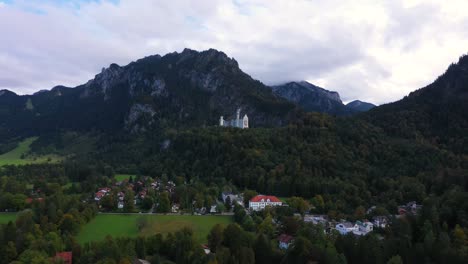 drone flying to castle neuschwanstein in bavaria, germany in 4k