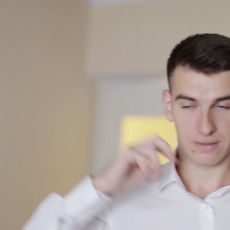 groom getting ready dressed