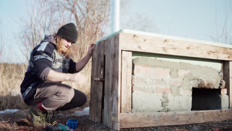 Man-Attaching-Wood-Planks-Using-Wireless-Screw-Driver-In-Diy-Hot-Tub