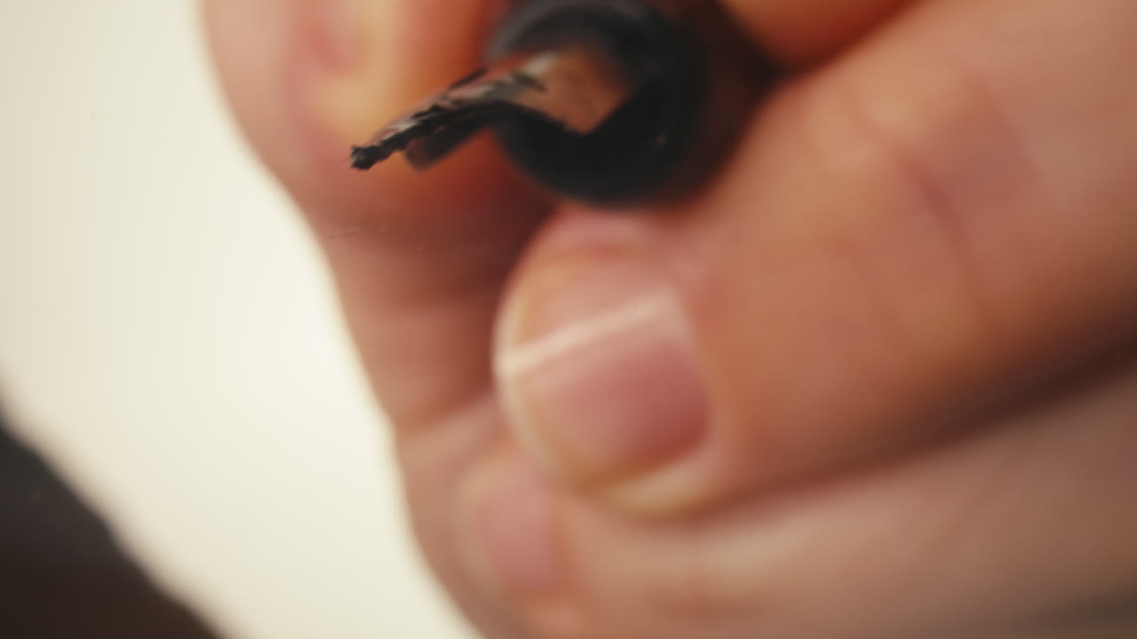 Close-Up of Hand Writing 'Joey' with a Fountain Pen