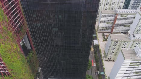 aerial view of modern skyscraper and urban neighborhood