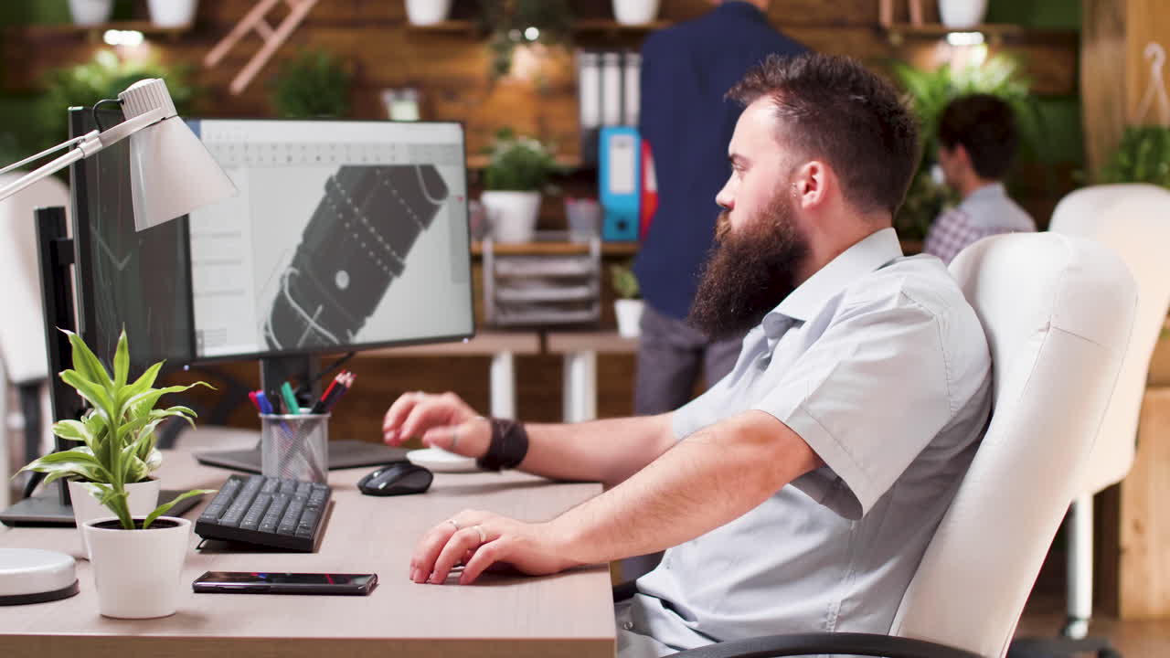 Man working at a computer in an office