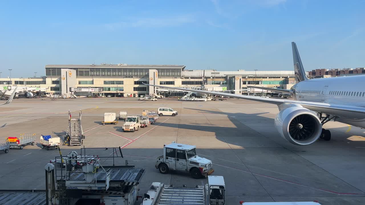 Planes landing and taking off on runway at frankfurt airport germany