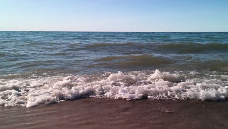 waves crashing at the beach