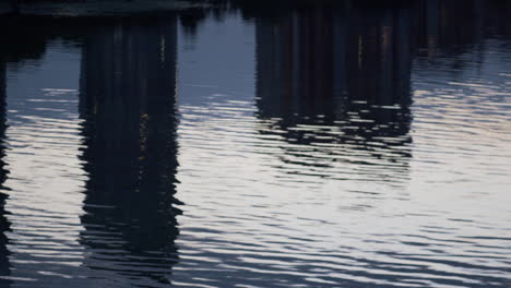 calm still water texture drone shot. wavy river ripples flowing surface concept.