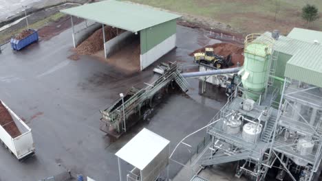 aerial drone view looking directly down onto rooftops and sections of the drt factory, showcasing its industrial layout in veille-saint-girons, france