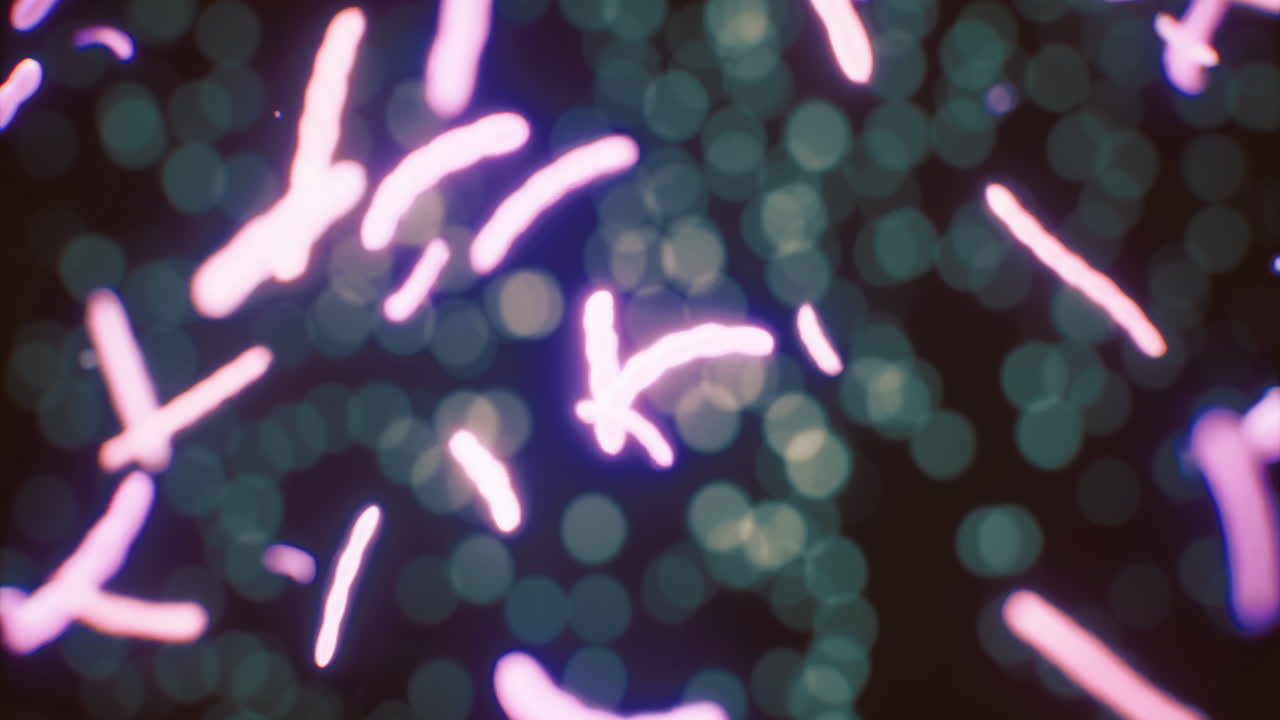 Microscopic view of vibrant microorganisms swimming in a colorful environment