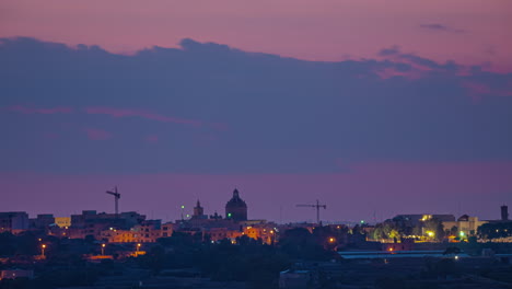 city with pink sky, skyline of a city