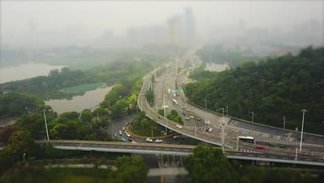 day time wuhan cityscape traffic road junction aerial lake view 4k tilt shift china