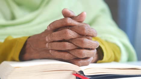 elderly person praying