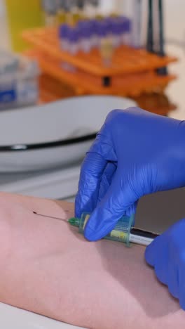 nurse in gloves taking blood from patient finger using glass slide in laboratory closeup 4k movie slow motion. complete blood count laboratory diagnostics