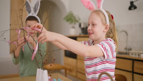 children decorating for easter