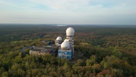 amazing aerial view flight pull in drone of radom in
autumn forest at morning sunrise, devil's mountain in woods berlin october 2022